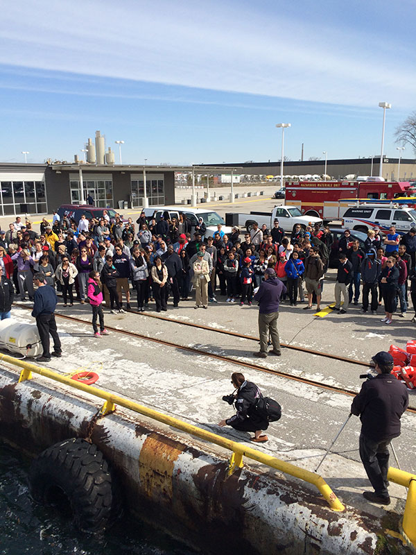 Many spectators viewing a presentation