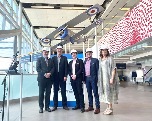 Staff standing in the atrium of Billy Bishop Airport